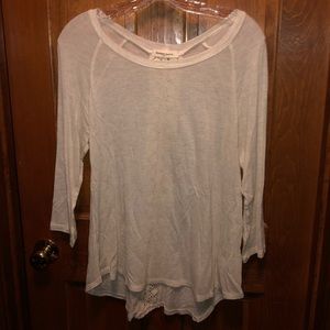 Small tan shirt. Newbury Kustom